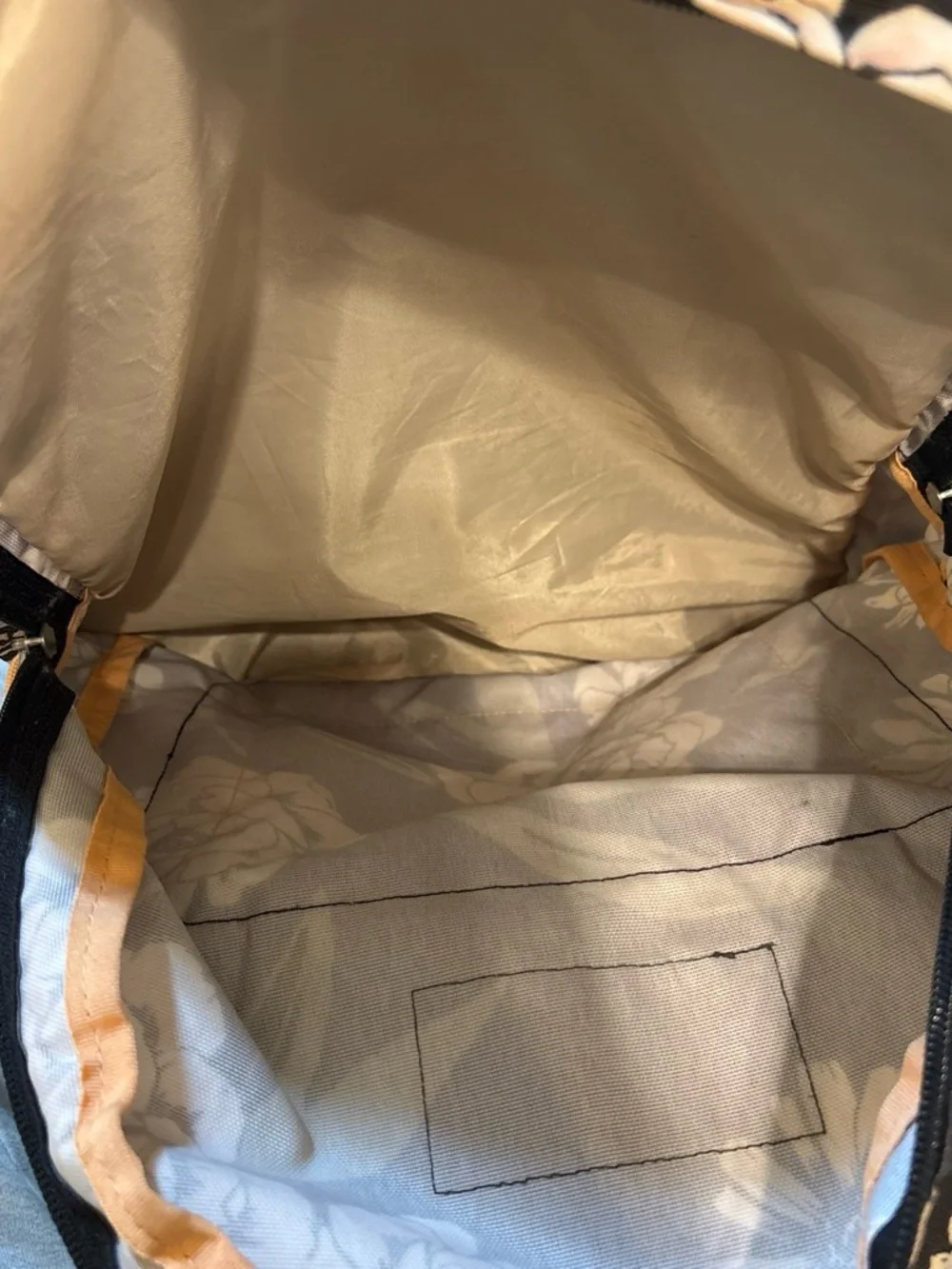 Jansport Trans Black Floral Backpack with Brown Base
